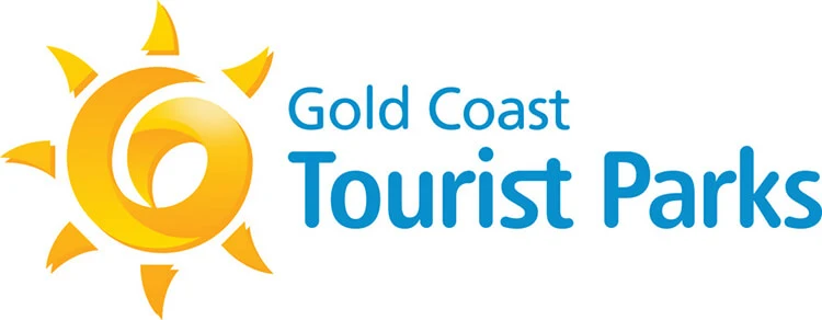 Logo of Gold Coast Tourist Parks featuring a stylized yellow sun on the left and the text 