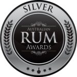 Silver medal badge for the Australian Rum Awards, featuring laurel leaves and decorative text on a black and silver circular design.